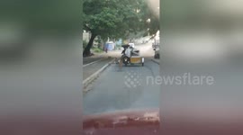 Loyal dog who 'doesn't want owner to go to work' chases him along road for more than a mile