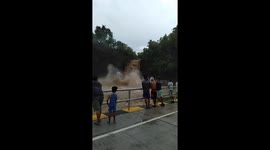 Waterfall gushes after heavy rain and flooding in the Philippines