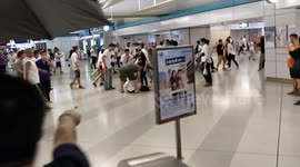 JULY 21: Protesters use water hose to defend themselves against marauding gang at Yuen Long Station