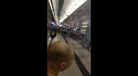 Armed mob in white T-shirts attack Hong Kong commuters on train at Yuen Long station