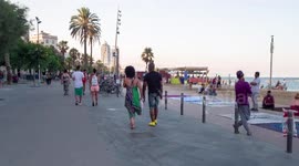 hyper lapse POV shot along the beach in barcelona