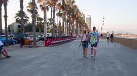 hyper lapse POV shot along the beach in barcelona