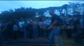Commuters in Venezuela's Caracas forced to walk in the dark amid nationwide blackout