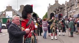 Scottish parade stops for wee dram on route to the 178th Tomintoul 'friendly' Highland Games