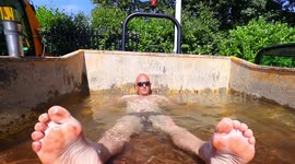 UK man finds a dump truck to cool down during heatwave