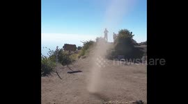 A man uses his kung-fu moves on a dust devil