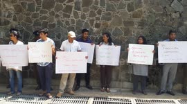 Sri Lankans protesting in front of British High Commission Colombo demanding Britain to re-import their hazardous hospital wastes in question