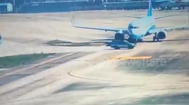 SUV almost collides with plane after driving across runway at Fuzhou's airport