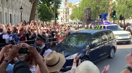 Boris Johnson greeted by a mix of cheers and jeers at Downing Street after being announced as Prime Minister