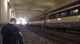 Newsflare Edit - Passengers forced to exit Eurostar amid heatwave after train loses power near Brussels