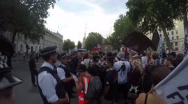 Police Hold The Line Against Protestors Outside Downing Street