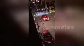 Hundreds flee from Tottenham estate after police arrive at the scene of 'block party'