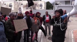 Anti corruption activists protest outside German Consulate in Cape Town