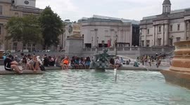 Londoners cool off in fountains on 2nd hottest UK day ever