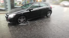 UK heatwave brings torrential rain in Ambleside, The Lake District, UK