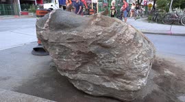 Over a billion-year-old granite rock unearthed in downtown Toronto during road construction