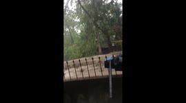 Raging Flash Flood Gushes Past House