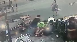 Concrete block hits woman with baby in arms after falling from building in China