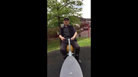 Grampa having fun in a seesaw with his daughter