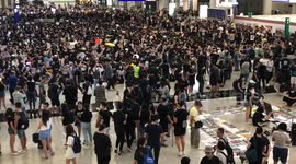 JULY 26: Watch Hong Kong protesters occupy airport, sing protest song from 'Les Miserables'