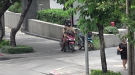 Motorcyclists still riding on pavements in Thailand despite fines being doubled