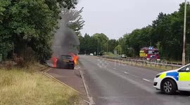 Car engulfed in flames amid UK summer heatwave