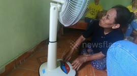 A blind Vietnamese woman's tears of joy for her first electric fan