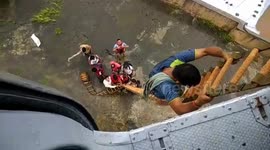 Terrifying footage of helicopter rescue of nine people from floodwaters in India