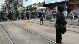 Standoff between police and protesters in Hong Kong's Yuen Long district