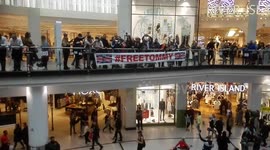 Supporters of Tommy Robinson hold noisy protest inside Manchester's Arndale