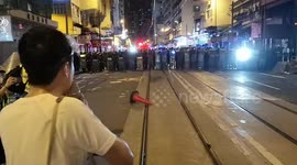Hong Kong lawmaker tries to persuade police to let protesters retreat