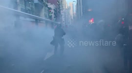 Hong Kong police move to forcefully clear protesters, using tear gas