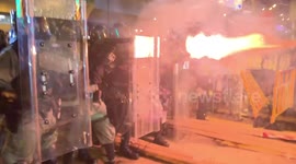 Hong Kong police fire tear gas and rubber bullets at protesters near China's liaison office