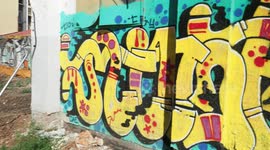 Graffiti sprayed wall in the poblenou neighbourhood of barcelona, spain