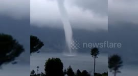 Huge tornado filmed above lake in Sumatra, Indonesia