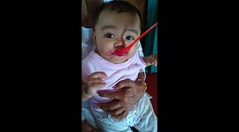 babies eat hard on their faces