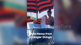These exclusive videos show Stranger Things co-stars Natalia Dyer and Charlie Heaton relaxing on the beach during a romantic holiday to Italy