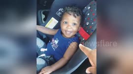 'Who me?' Toddler can't keep a straight face as mom lectures him