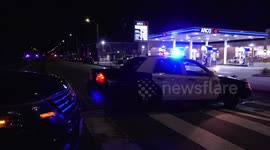 Police cordon area of shooting in Hyde Park neighborhood, Los Angeles