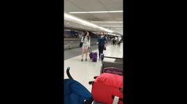 Woman bursts into tears after seeing her newborn nephew for the first time at LA airport