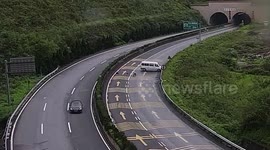 Two people thrown out of minibus after slamming into guardrails on Chinese highway