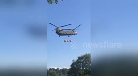RAF joins effort to save damaged reservoir in Whaley Bridge, Derbyshire