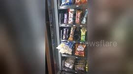 London office workers go crazy for epic vending machine win!
