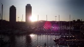 mafre tower and arts hotel buildings in port olympic, Barcelona at sunset