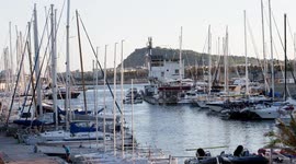 mafre tower and arts hotel buildings in port olympic, Barcelona at sunset
