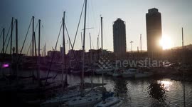 mafre tower and arts hotel buildings in port olympic, Barcelona at sunset