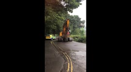 Digger arrives at Toddbrook in Whaley Bridge.