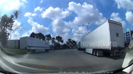 car runs through flashing train warning signal