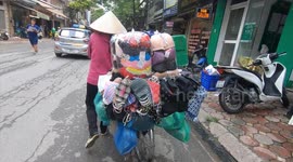 Unique business of all items on bicycles on the street in Vietnam