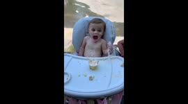 Baby gets first brain freeze after some summertime ice cream!